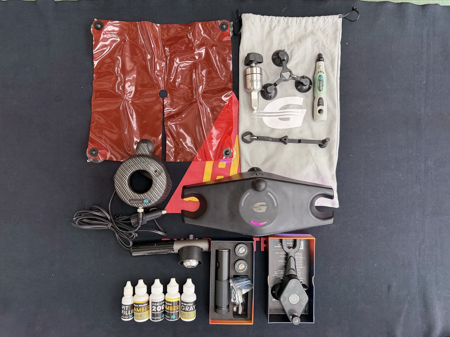 超群立可補玻璃修補設備全景，包含注射器、修補工具、樹脂及固化相關設備
